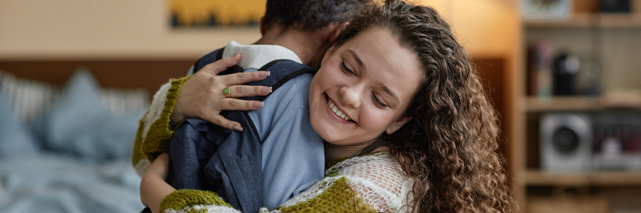 parent guide - mum hugging child